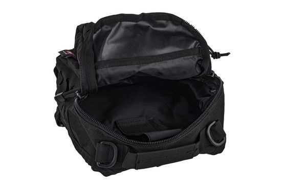 Primary Arms black sling bag opened to show internal compartments